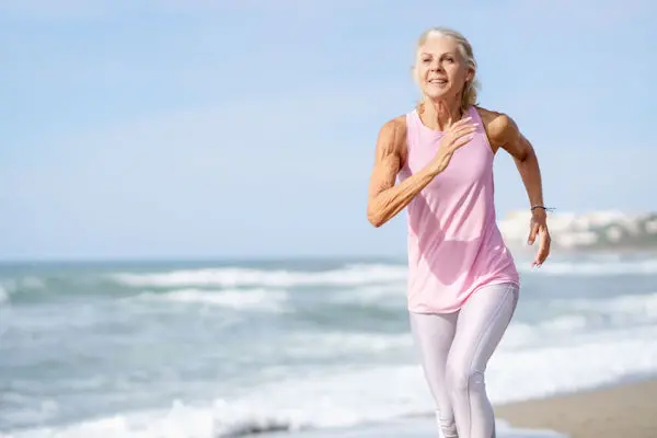 woman running on beach
